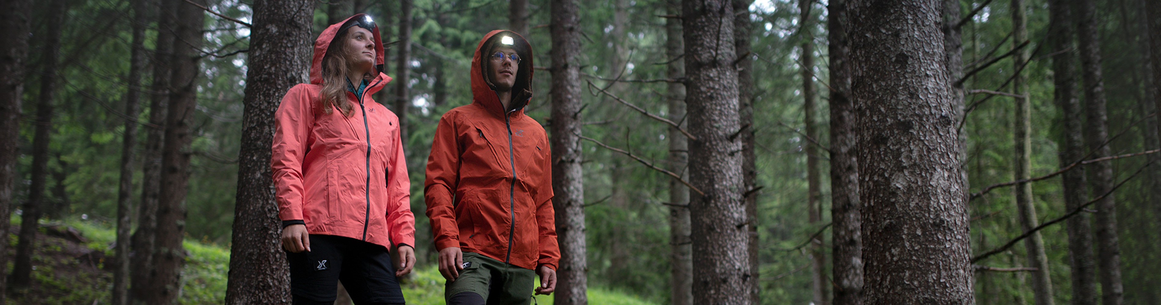 man and women hiking in the woods.jpg